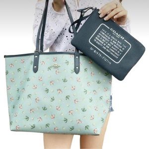 Coach Umbrella Reversible Tote. Used. Loved. Wear on bottom corners.